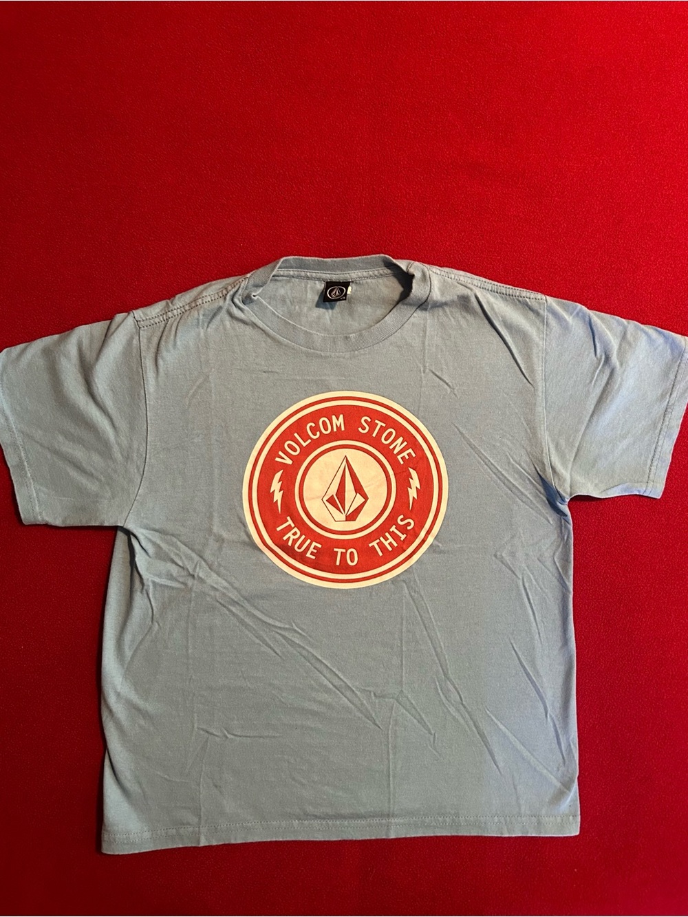 Volcom Light Blue Short Sleeve Tee with Red Logo Badge